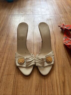 Gucci Cream Leather Slide Mules with Gold Medallion